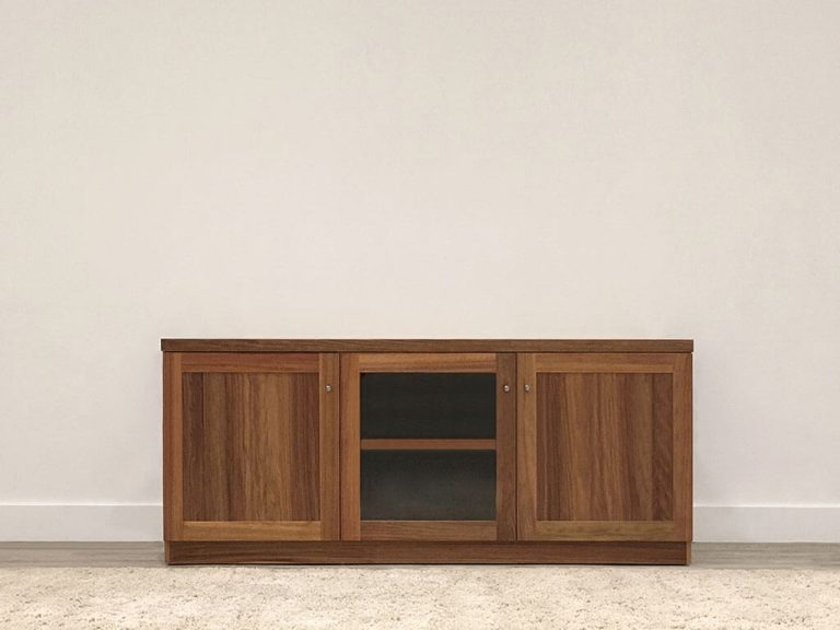 modern entertainment unit in solid blackwood timber with glass door and timber doors and character grain