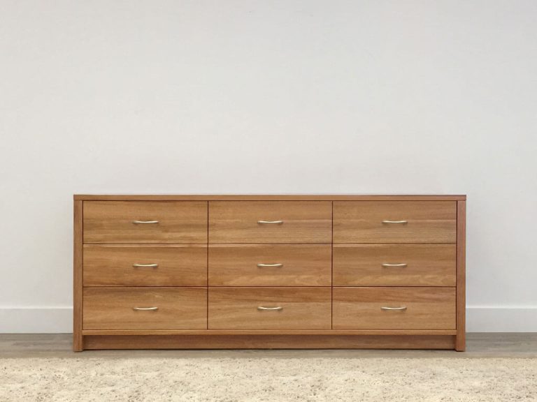 chest of 9 drawers with full base and comfortable curved handles crafted in tasmanian blackwood