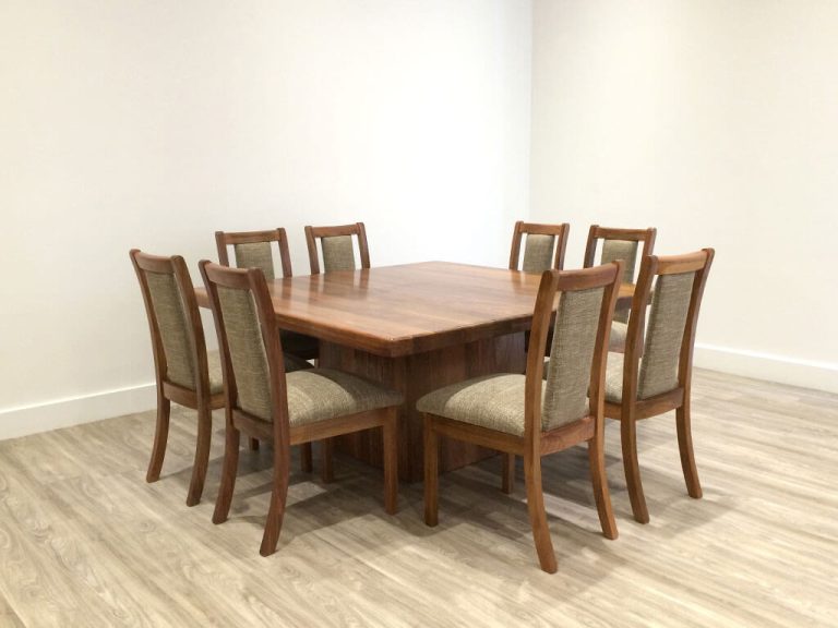 large timber dining table with pedestal base and rounded corner top made in blackwood timber