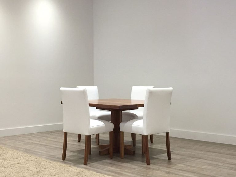 custom extendable dining table in toned timber with pedestal base and tapered rectangular top made in adelaide