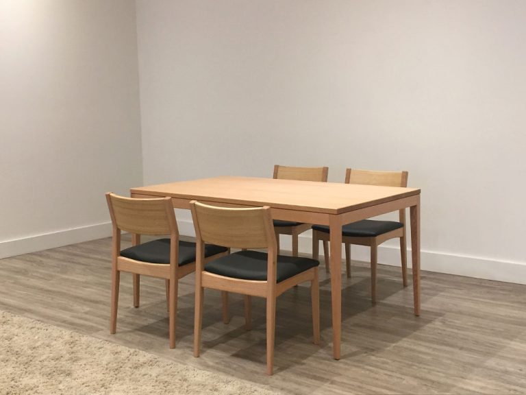 1.5 metre rounded top dining table for small spaces and rounded leg dining chairs with timber back