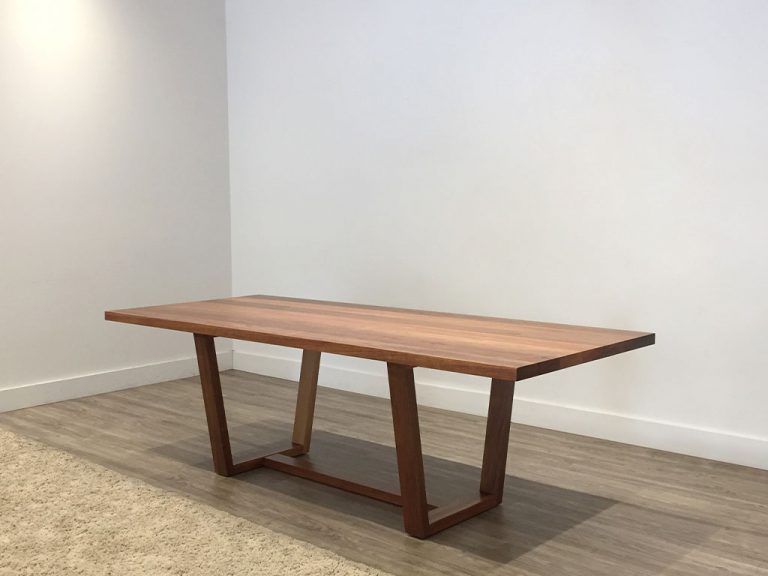 custom dining table made from tasmanian blackwood timber top with open base legs