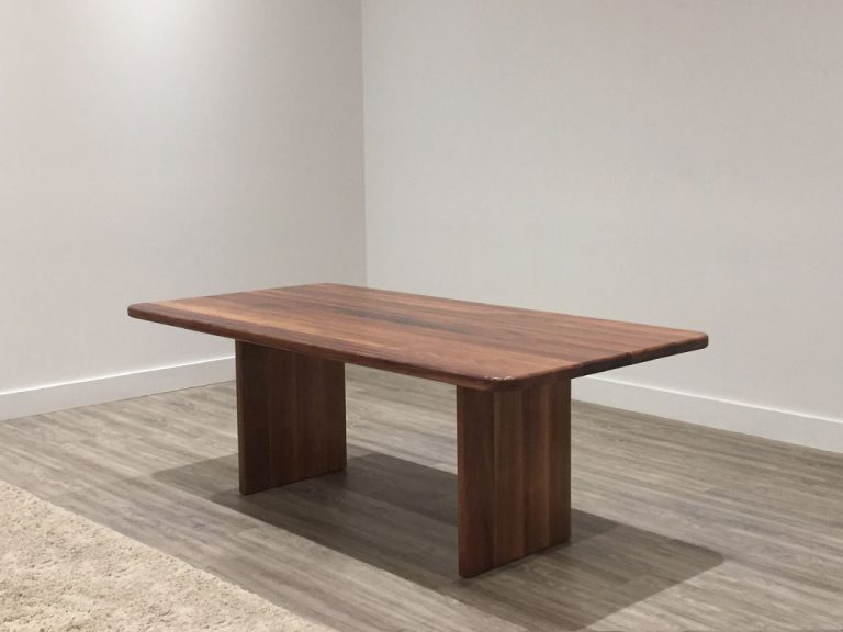 rounded solid timber table top as a 6 seater