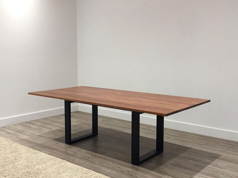 modern timber dining table with a contemporary black open base