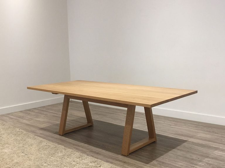 custom extension table with mountain ash top and black trestle style base