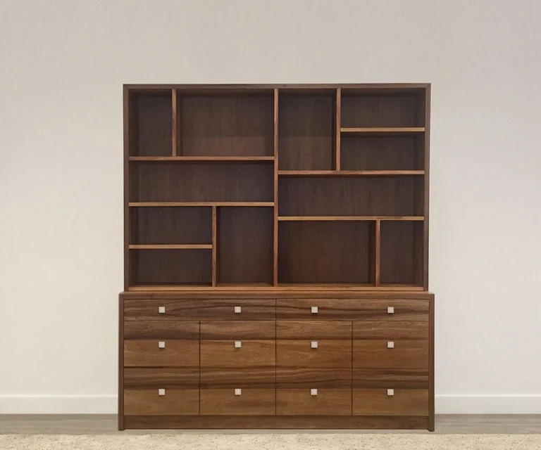 handcrafted custom home office storage unit with 12 abstract shelves and 10 drawers, made from australian timber