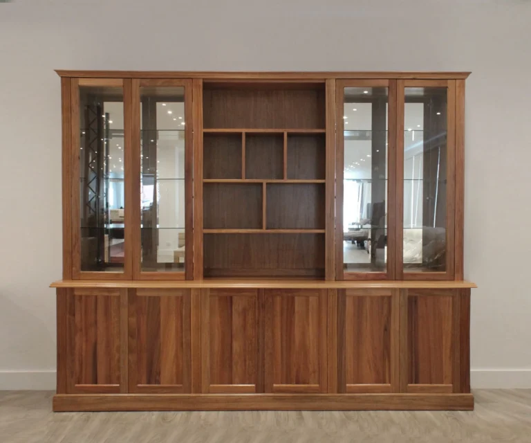 custom home office storage unit with abstract center shelving, 4 glass doors with mirror backing, and 6 doors below