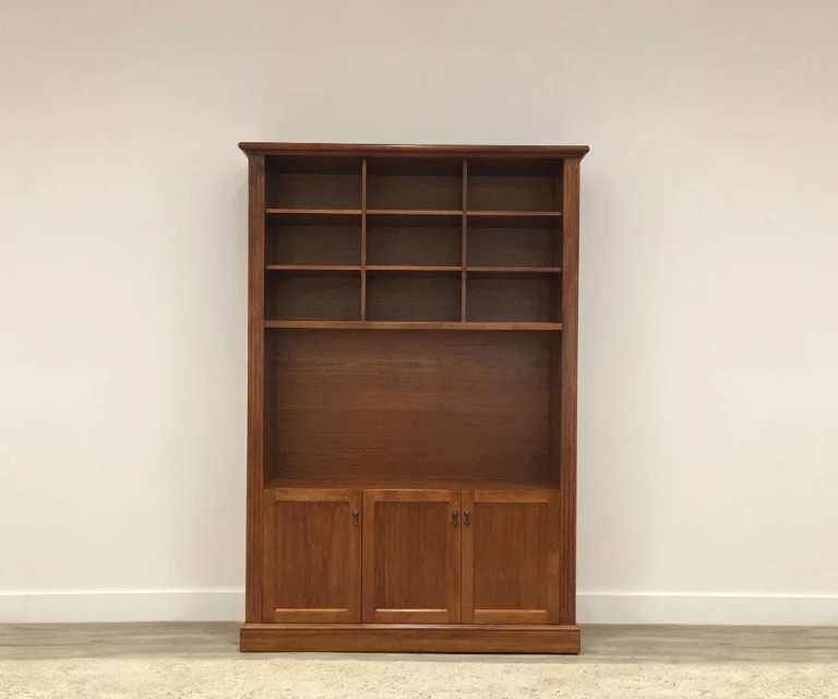 dark toned tasmanian blackwood ornate storage unit with large open center space, shelving above, and doors below.