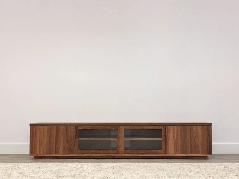 custom tv entertainment unit made from blackwood timber with 2 doors and 2 glass panels