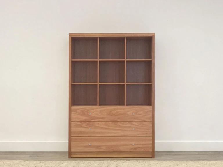 bespoke narrow bookcase with mixed shelving and two door spaces in tasmanian blackwood timber made handmade locally