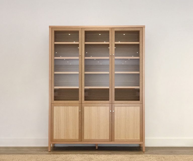 custom timber wall unit with 3 glass doors and 3 timber doors with square edges