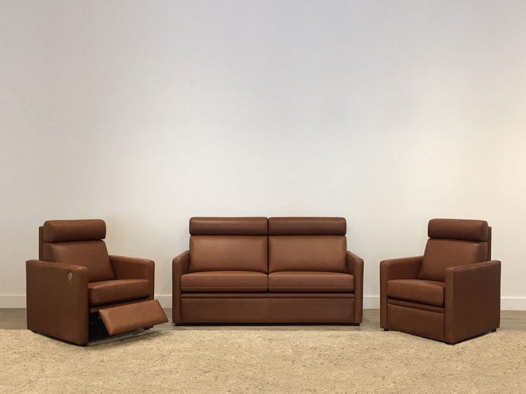 Custom tan leather lounge suite with head rest and recliner option, all made in adelaide