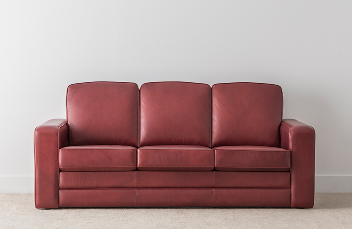 burgundy leather 3 seater 3 cushion lounge with high back and full base and wide arm