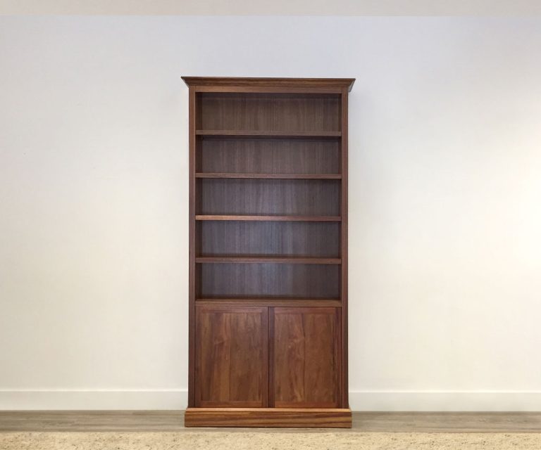 solid australian timber hardwood bookcase with 5 shelves and storage below