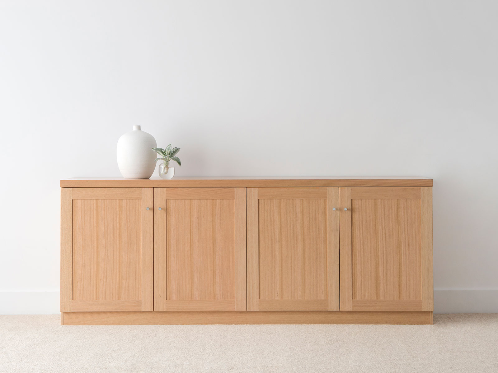 4 door square edge sideboard with recessed panel doors and chrome handles