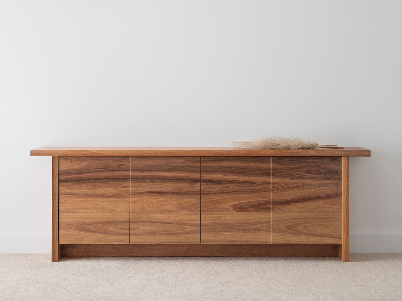 2.4 metre contemporary sideboard with thin overhang and push to open drawers and set back full base