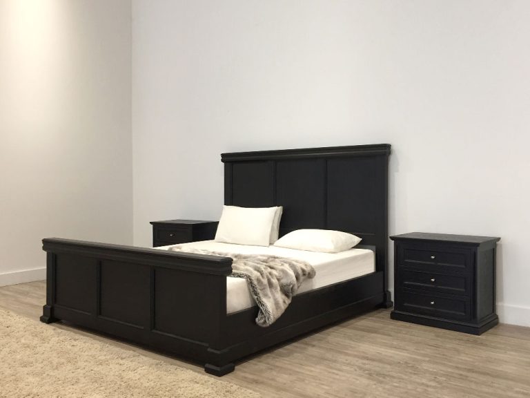 custom made black timber bed with high headboard