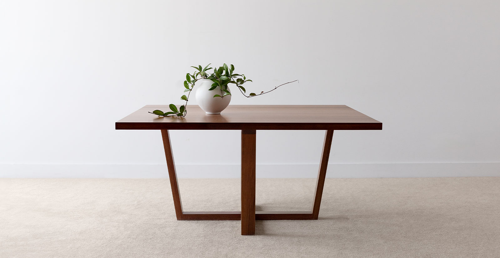 handcrafted australian timber dining table with square top and cross legs