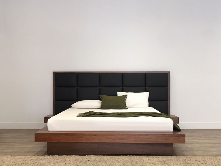 custom king size bed with leather upholstered headboard and floating bedside tables made in adelaide