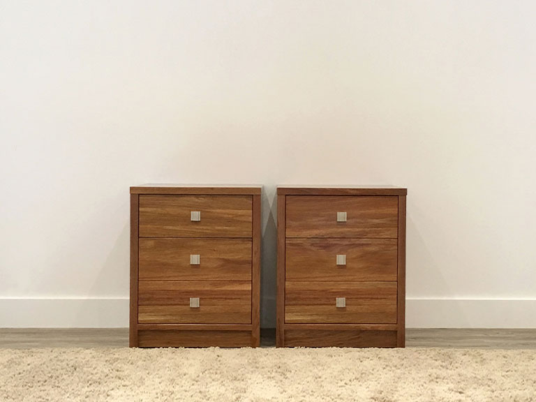 set of timber bedside tables with square handles