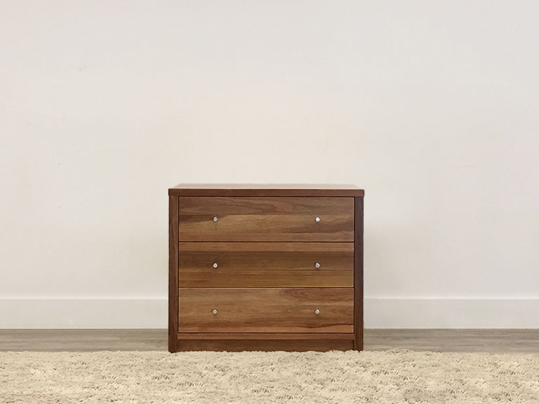 custom timber bedside table with silver knobs