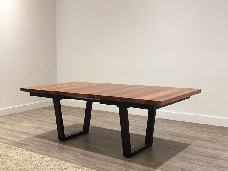 small extendable dining table at 1.7m closed opening to 2.3m, australian made with black base