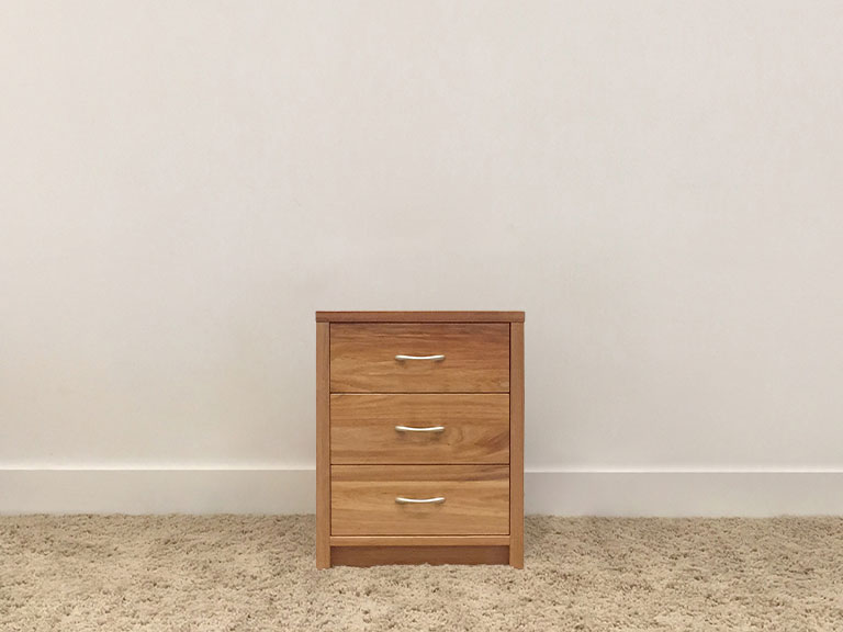 bedside table with traditional silver handles