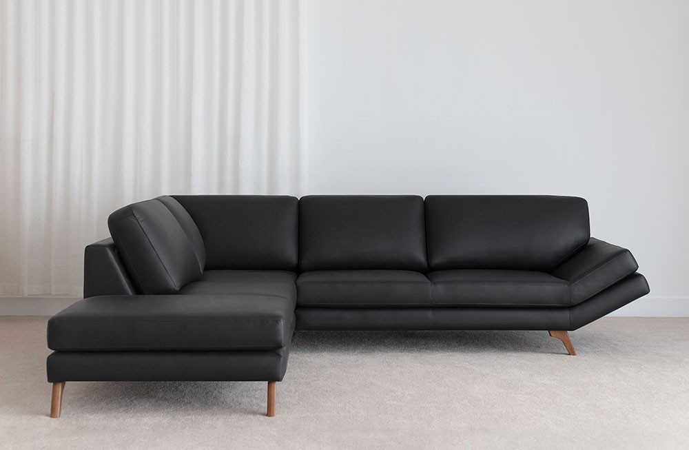 black leather lounge with angle design