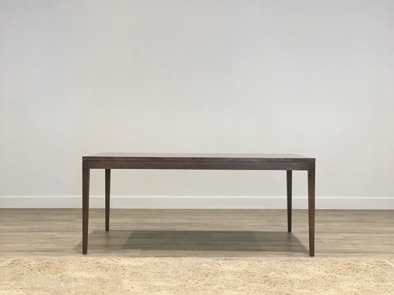 chocolate tone solid timber dining table on 4 legs