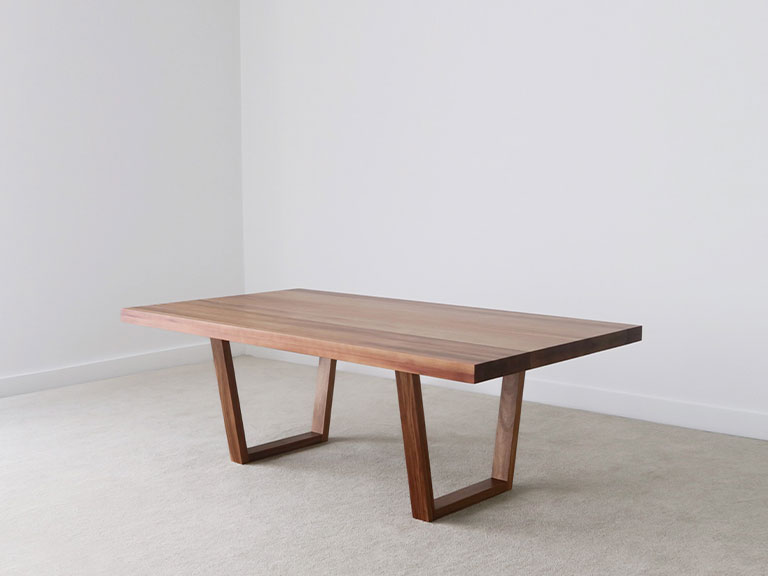 2.2 metre solid timber dining table with angular open base